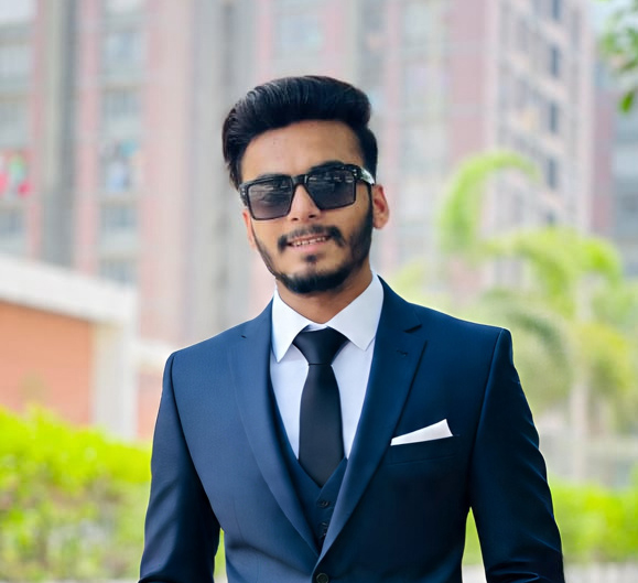 MILAN R. DHANDHUKIYA